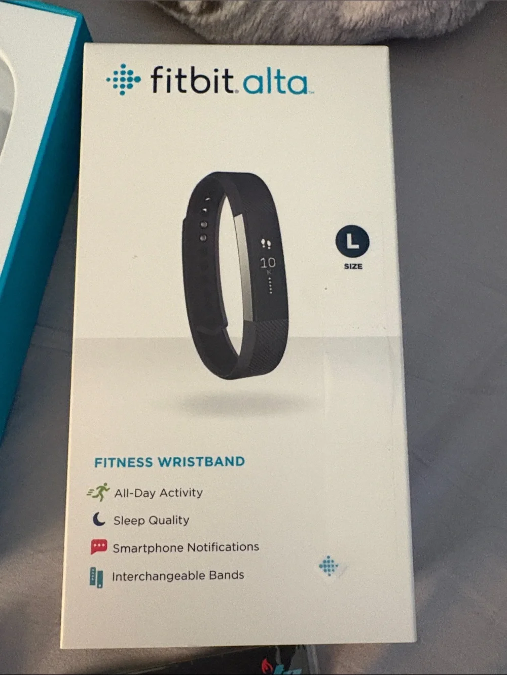 fitbit Alta black fitness wristband with accessories